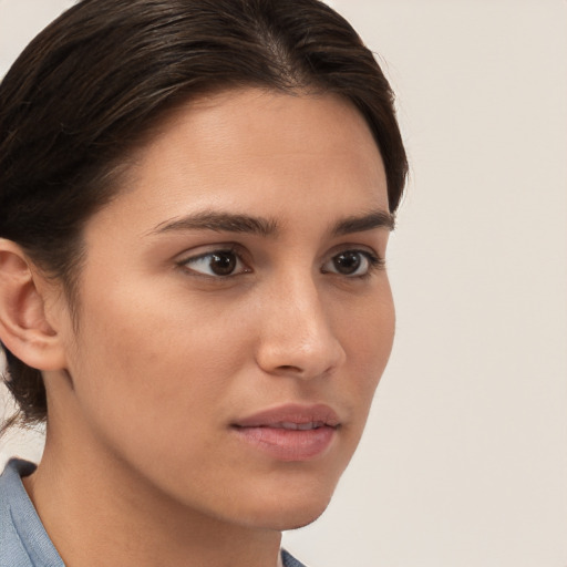 Neutral white young-adult female with short  brown hair and brown eyes