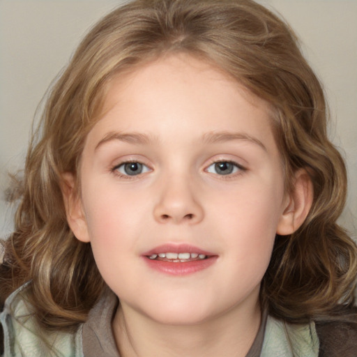 Joyful white child female with medium  brown hair and blue eyes