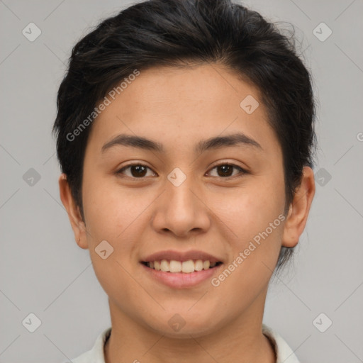 Joyful asian young-adult female with short  brown hair and brown eyes