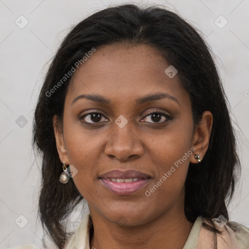 Joyful black young-adult female with medium  brown hair and brown eyes