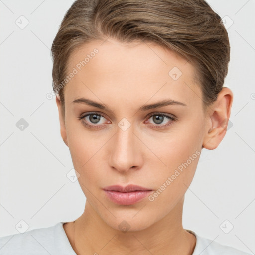 Neutral white young-adult female with short  brown hair and brown eyes