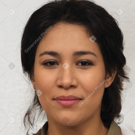 Joyful latino young-adult female with medium  brown hair and brown eyes