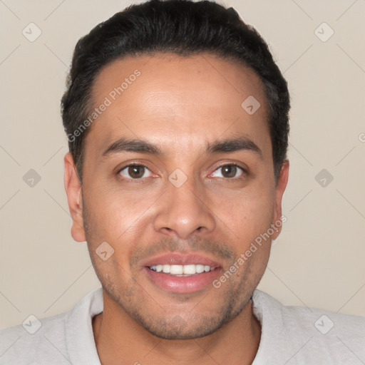 Joyful white young-adult male with short  black hair and brown eyes