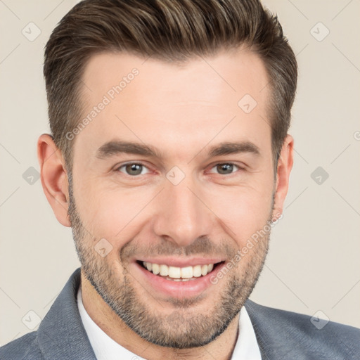 Joyful white young-adult male with short  brown hair and brown eyes