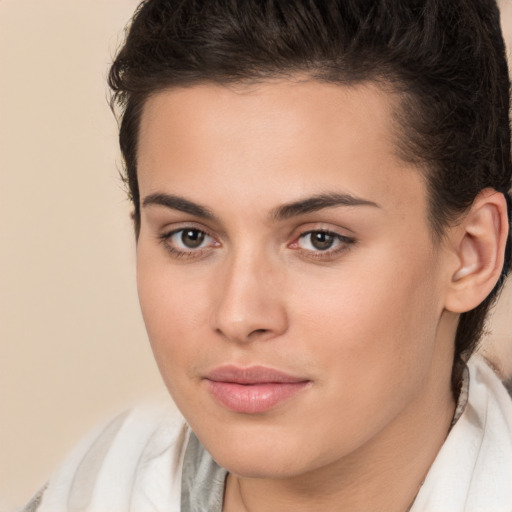 Joyful white young-adult female with medium  brown hair and brown eyes