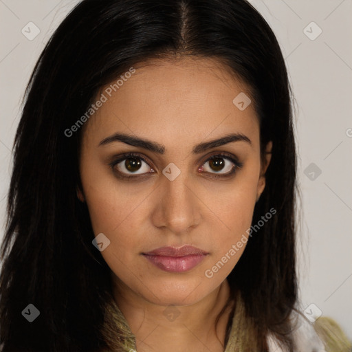 Joyful latino young-adult female with long  brown hair and brown eyes