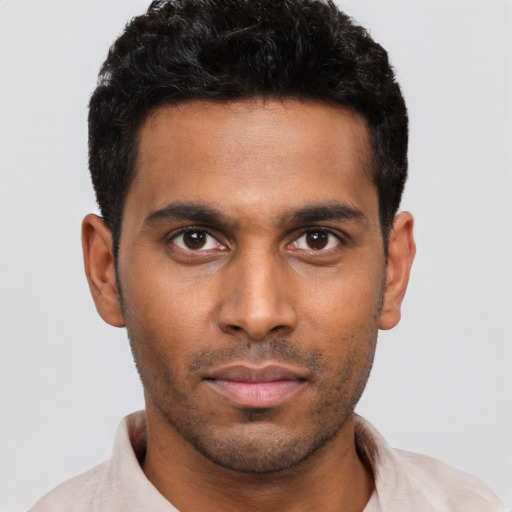 Neutral black young-adult male with short  brown hair and brown eyes