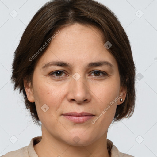 Joyful white adult female with medium  brown hair and brown eyes