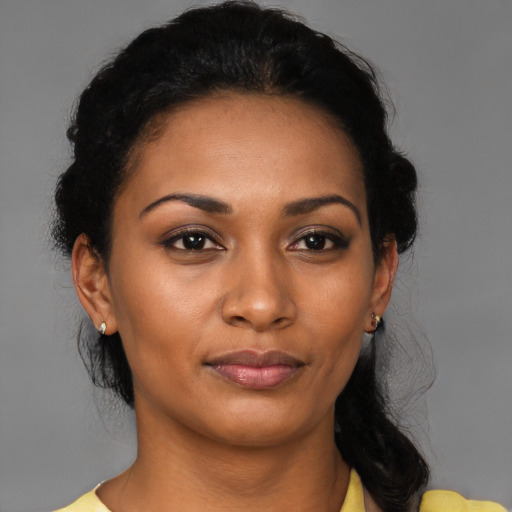 Neutral black young-adult female with medium  black hair and brown eyes