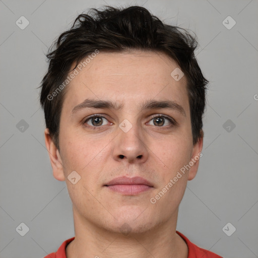 Neutral white young-adult male with short  brown hair and brown eyes