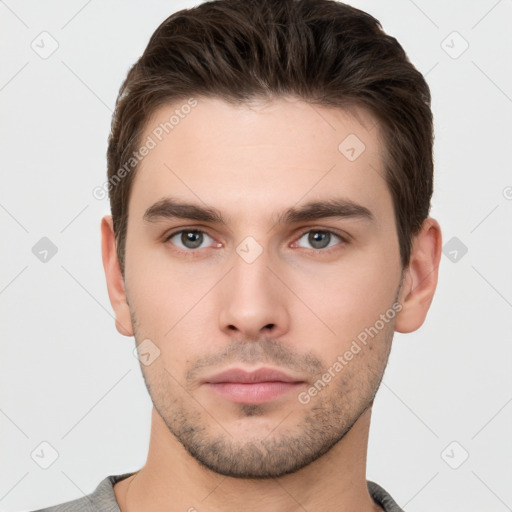 Neutral white young-adult male with short  brown hair and brown eyes