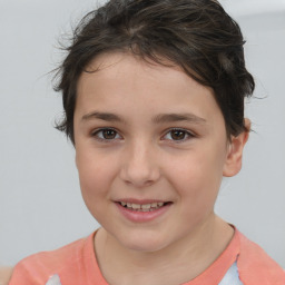 Joyful white child female with short  brown hair and brown eyes