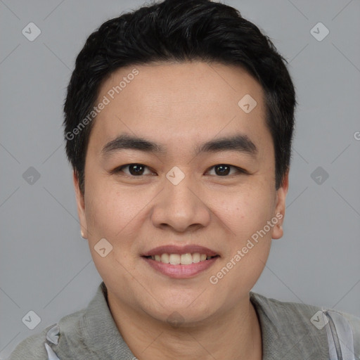 Joyful asian young-adult male with short  black hair and brown eyes