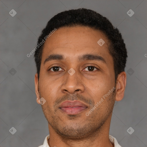 Neutral latino young-adult male with short  brown hair and brown eyes