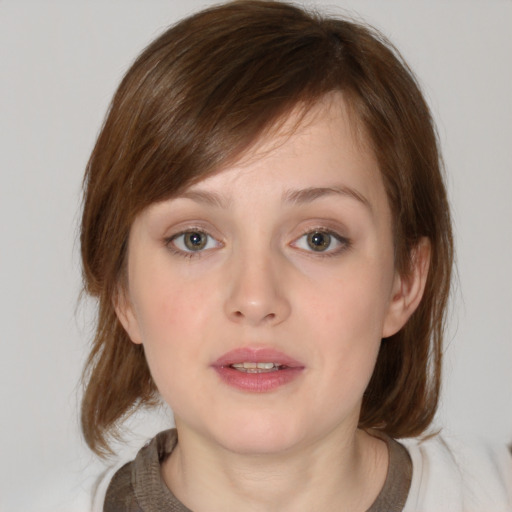 Neutral white young-adult female with medium  brown hair and grey eyes