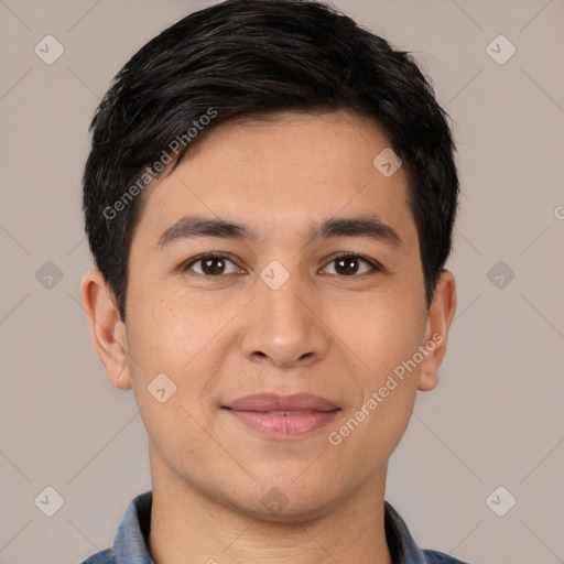 Joyful white young-adult male with short  black hair and brown eyes