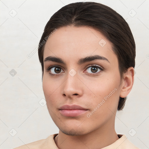 Neutral white young-adult female with short  brown hair and brown eyes