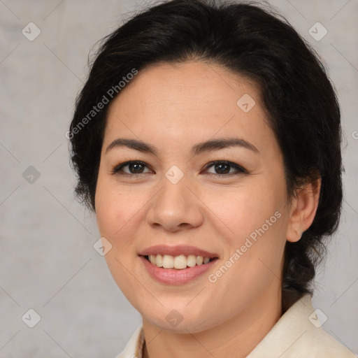 Joyful latino young-adult female with medium  brown hair and brown eyes