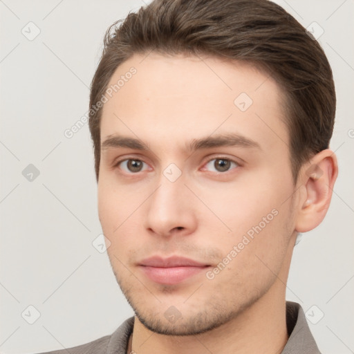 Neutral white young-adult male with short  brown hair and brown eyes