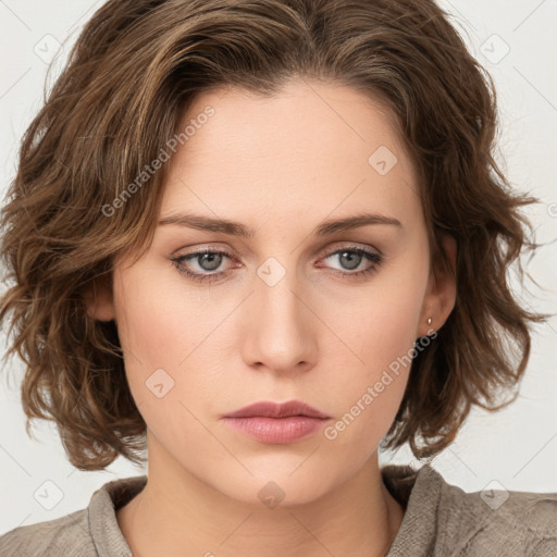 Neutral white young-adult female with medium  brown hair and green eyes