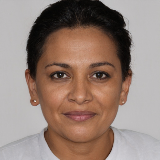 Joyful white adult female with short  brown hair and brown eyes