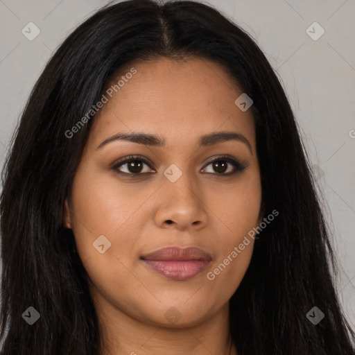 Joyful latino young-adult female with long  brown hair and brown eyes