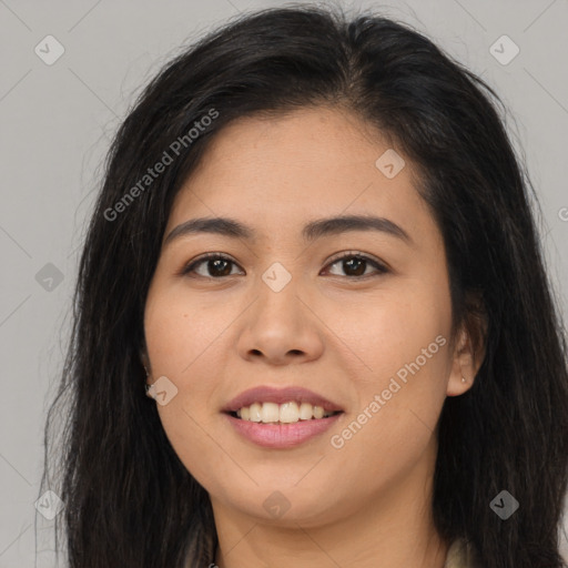 Joyful asian young-adult female with long  brown hair and brown eyes