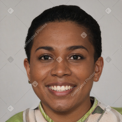 Joyful black young-adult female with short  brown hair and brown eyes