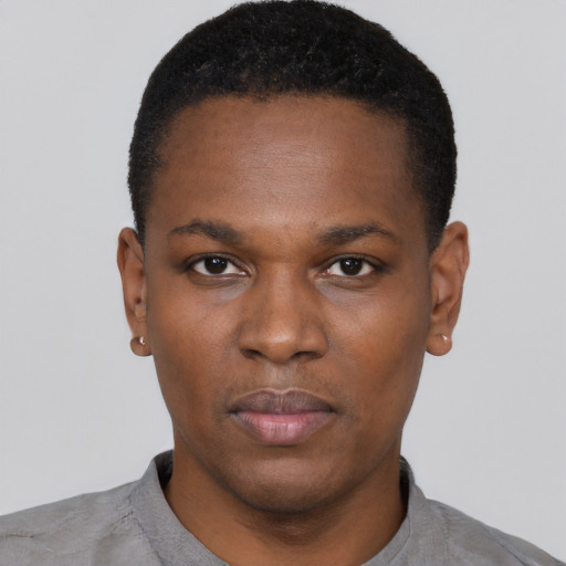 Neutral black young-adult male with short  black hair and brown eyes