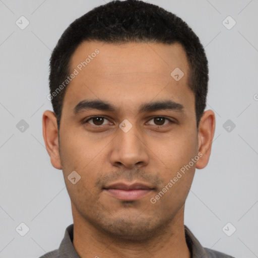 Neutral latino young-adult male with short  black hair and brown eyes