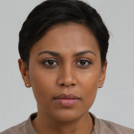 Neutral asian young-adult female with short  brown hair and brown eyes