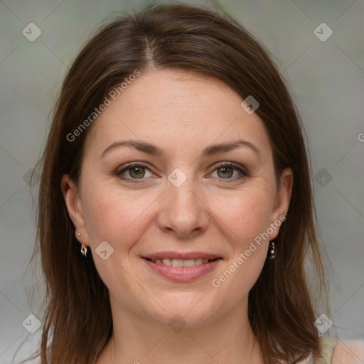 Joyful white adult female with medium  brown hair and grey eyes