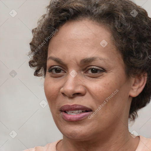 Joyful white adult female with short  brown hair and brown eyes