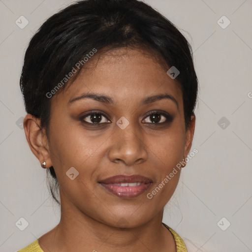 Joyful black young-adult female with short  brown hair and brown eyes