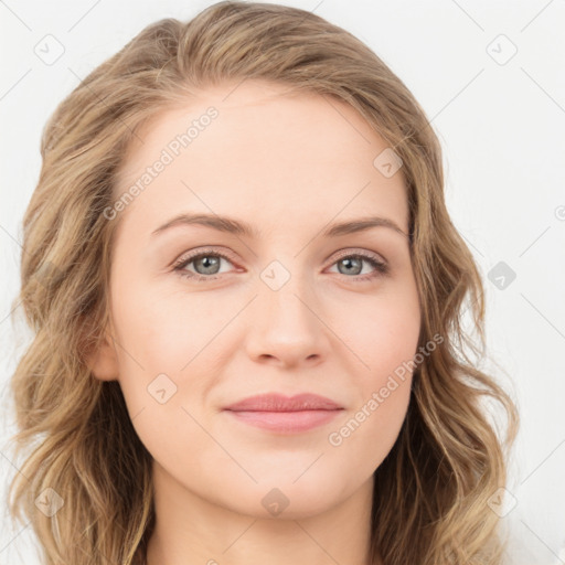 Joyful white young-adult female with long  brown hair and blue eyes