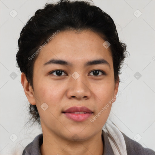 Joyful latino young-adult female with short  brown hair and brown eyes