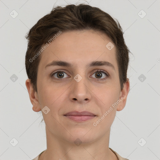 Joyful white young-adult female with short  brown hair and grey eyes