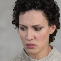 Neutral white adult female with medium  brown hair and brown eyes