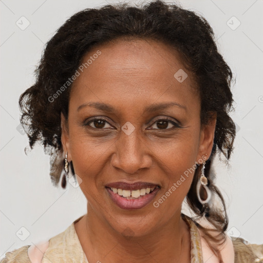 Joyful black adult female with medium  brown hair and brown eyes