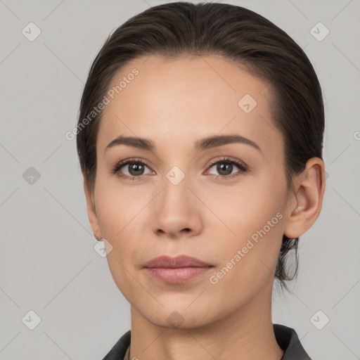 Neutral white young-adult female with medium  brown hair and brown eyes