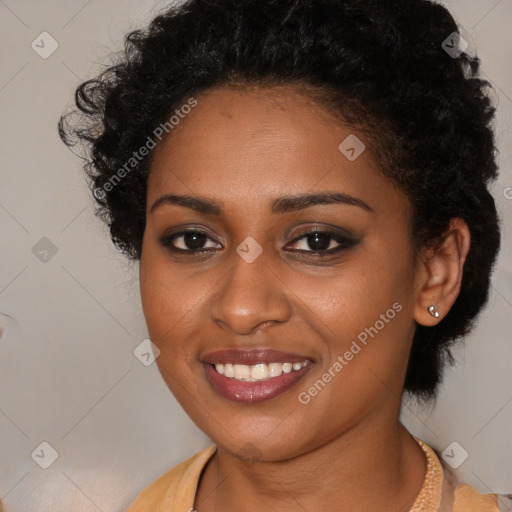 Joyful black young-adult female with medium  brown hair and brown eyes