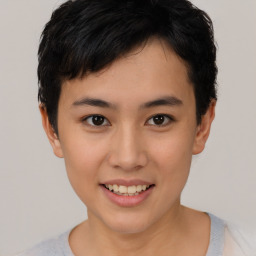 Joyful asian young-adult female with short  brown hair and brown eyes