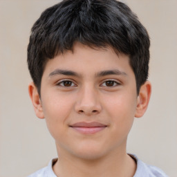 Joyful white child male with short  brown hair and brown eyes