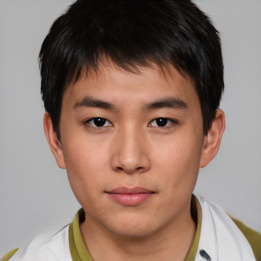 Neutral asian young-adult male with short  brown hair and brown eyes
