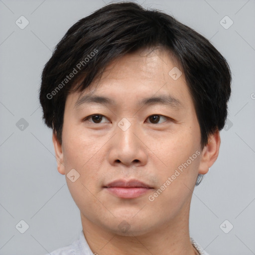 Neutral asian young-adult male with short  brown hair and brown eyes