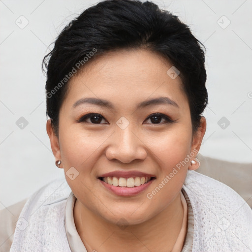 Joyful asian young-adult female with short  brown hair and brown eyes