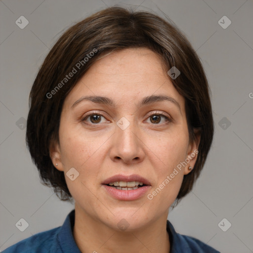 Joyful white adult female with medium  brown hair and grey eyes