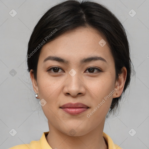 Joyful asian young-adult female with medium  brown hair and brown eyes