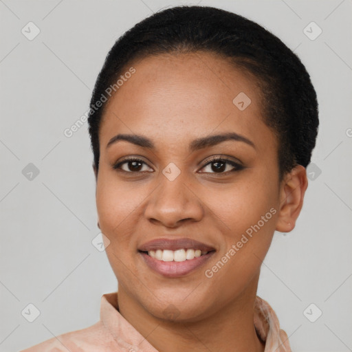 Joyful latino young-adult female with short  brown hair and brown eyes