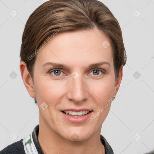 Joyful white young-adult female with short  brown hair and grey eyes